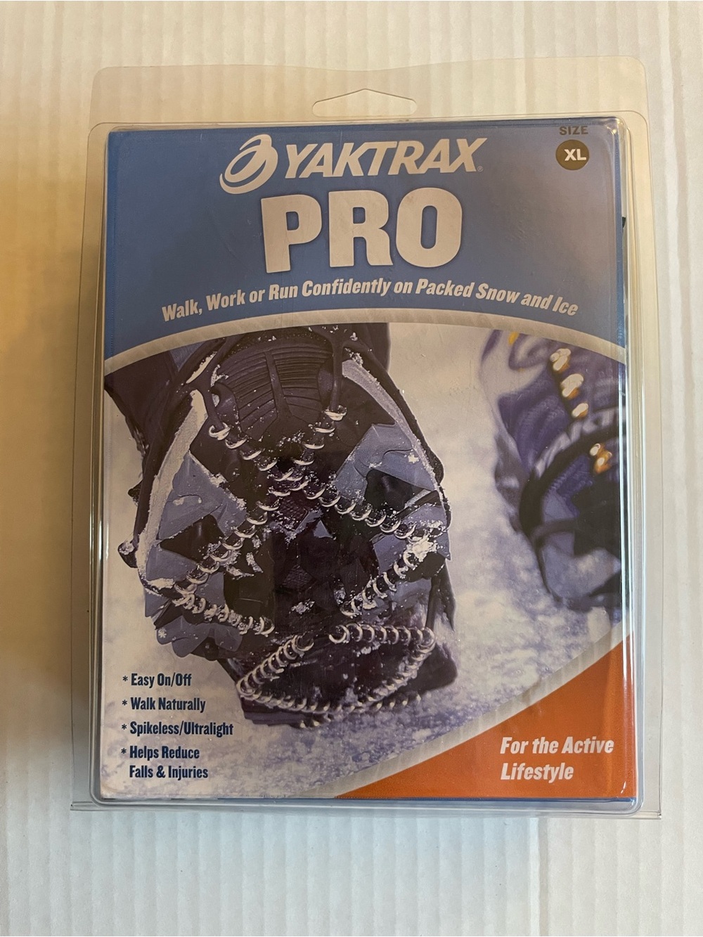 YAKTRAX PRO Ice Traction Cleats in Blue and White Packaging